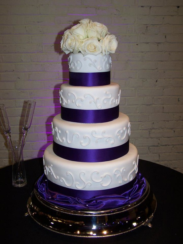 4 tiered purple white wedding cake phillips fairy tale weddings